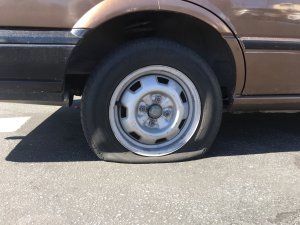 A tire that was slashed in Boyle Heights is seen on Feb. 11, 2019. (Credit: John Neis/KTLA)
