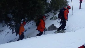 Los Angeles County Sheriff's Department Search & Rescue Team Members work at the scene where a runner slipped on ice and fell to his death along a trail near Mt. Wilson on Feb. 17, 2019. (Credit: Los Angeles County Sheriff's Department)
