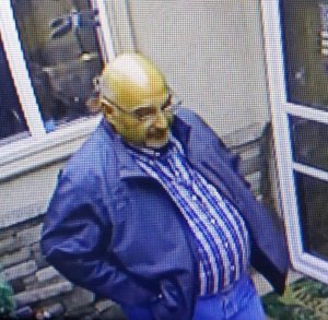 Los Angeles police provided this image on Feb. 20, 2019, saying the man seen is a person of interest in the scam case.