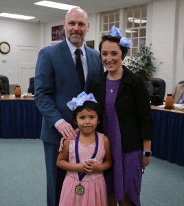Five-year-old Prisilla, front, stands with (from left) Superintendent Tim Harkrider and teacher Shannon Grimm in a photo posted to Facebook by the Willis Independent School District on Feb. 13, 2019.