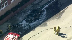 A police pursuit ended with a fiery crash in Whittier on Feb. 18, 2019, sending both a suspect and an uninvolved motorist to the hospital, officials said. (Credit: KTLA)