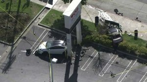 Two of three vehicles involved in a violent crash are shown on March 26, 2019. (Credit: KTLA)