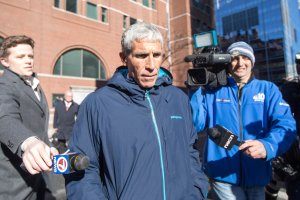 William "Rick" Singer leaves Boston Federal Court after being charged with racketeering conspiracy, money laundering conspiracy, conspiracy to defraud the United States and obstruction of justice on March 12, 2019. (Credit: Scott Eisen / Getty Images)