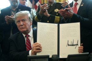 President Trump holds an executive veto, his first as president, in the Oval Office of the White House on March 15, 2019. (Credit: Alex Wong/Getty Images)