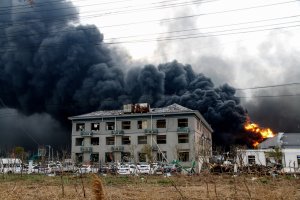This photo taken on March 21, 2019 shows fire and smoke rising at an explosion site in Yancheng in China's eastern Jiangsu province. (Credit: STR/AFP/Getty Images)