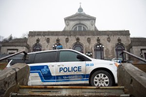 Police provide security at Saint Joseph's Oratory in Montreal on March 22, 2019, after Catholic Priest Claude Grou was stabbed during a livestreamed morning mass. (Credit: Sebastien St-Jean/AFP/Getty Images