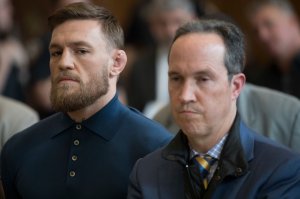 Conor McGregor stands with his lawyer Jim Walden during an arraignment in Brooklyn Criminal court on April 6, 2018 in New York City. (Credit: Mary Altaffer-Pool/Getty Images)