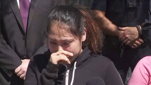 Liana Lopez, the sister of Steven Lopez, cries as she speaks to reporters on March 12, 2019. Steven was fatally shot in their Mid-City neighborhood nearly a year earlier on March 18, 2018. (Credit: KTLA)