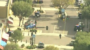 Police respond outside the Church of Scientology in Inglewood after a deadly officer-involved shooting on March 27, 2019. (Credit: KTLA)