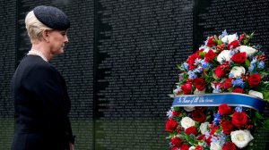 Cindy McCain, wife of, Sen. John McCain, R-Ariz., lays a wreath at the Vietnam Veterans Memorial during a funeral procession to carry the casket of her husband from the U.S. Capitol to National Cathedral for a Memorial Service on September 1, 2018 in Washington, DC.(Credit: Andrew Harnik - Pool/Getty Images)