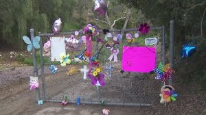 A memorial to an unidentified young girl found dead is seen on March 7, 2019, near where her body was discovered in Hacienda Heights two days before. (Credit: KTLA)