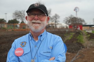 Mobile Loaves & Fishes founder Alan Graham stands in front of the organic farm in the heart of the Community First! Village. (Credit: CNN)