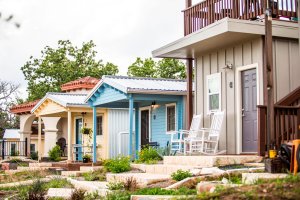 All the micro homes in Community First! Village offer front porches to encourage neighbors to get to know each other. (Credit: CNN)