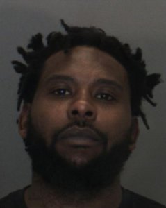 Tyrone Carlis Reid Jr., 36, is seen in a booking photo released March 18, 2019, by the San Bernardino County Sheriff's Department.