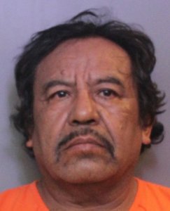 Carlos Carrizales is seen in a booking photo provided by the Polk County Sheriff's Office. 