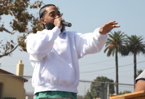 Nipsey Hussle speaks to kids at the Nipsey Hussle x PUMA Hoops Basketball Court Refurbishment Reveal Event on Oct. 22, 2018, in Los Angeles. (Credit: Jerritt Clark/Getty Images for PUMA)