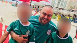 David Flores Ramos is seen with his two sons in an undated photo provided by family.