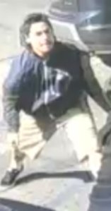 One of the people involved in a reported robbery March 16, 2019, at a Tustin liquor, is seen in this surveillance image released by police April 8, 2019.