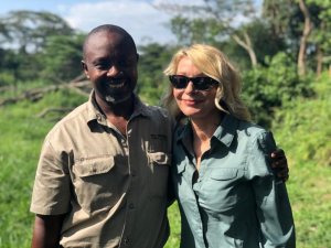 Kim Endicott and her tour guide, Jean Paul, appear in an image CNN obtained from Wild Frontiers on April 7, 2019.