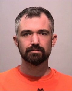 Roscoe Bradley Holyoake, 34, is seen in a booking photo released April 16, 2019, by the San Francisco Police Department.