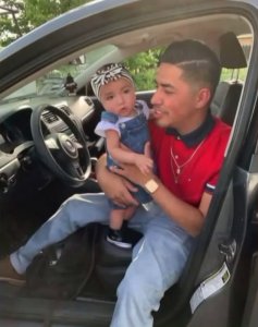 Alexia Echeverria is held by her father, Alexander Echeverria, in an undated photo provided by the family.