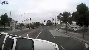 A still from a video released by Santa Ana police on May 16, 2019 shows an Acura about to crash into a big rig days earlier.