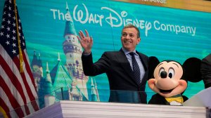 Walt Disney Company CEO Bob Iger and Mickey Mouse look on before ringing the opening bell at the New York Stock Exchange (NYSE), November 27, 2017 in New York City. (Drew Angerer/Getty Images)