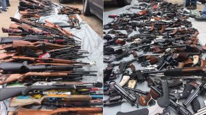 Some of the guns seized during an investigation in Bel-Air are shown in photos released by the LAPD on May 8, 2019. 