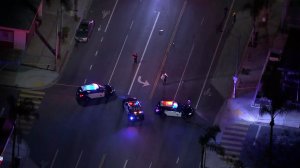 Police respond to the scene where a pedestrian was killed in a hit-and-run crash in Long Beach on May 20, 2019. (Credit: KTLA)