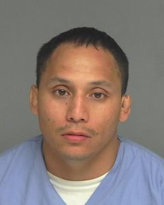 Andres Ramon Salas is seen in this booking photo from the Garden Grove Police Department.
