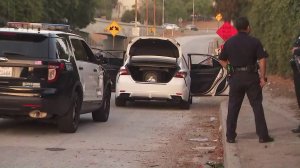 A car involved in a police shooting in Boyle Heights is seen after the driver was apprehended near the 101 Freeway on June 5, 2019. (Credit: KTLA)