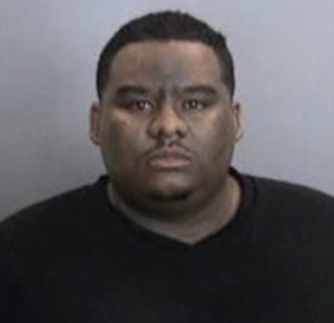 Angel Ortiz Diamond is seen in a booking photo released by the Orange County District Attorney's Office.
