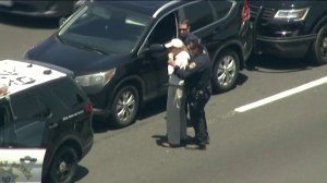 A driver was taken into custody in Sherman Oaks following a pursuit on June 12, 2019. (Credit: KTLA)