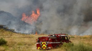 A brush fire burns in Moreno Valley on June 21, 2019. (Credit: Cal Fire)