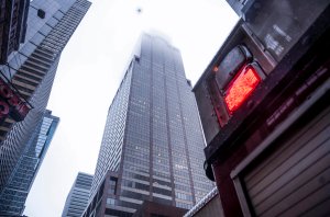 The building where a helicopter crash-landed on top is seen in Midtown Manhattan in New York on June 10, 2019. (Credit: JOHANNES EISELE/AFP/Getty Images)