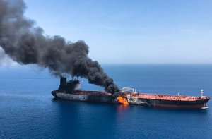 A picture obtained by AFP from Iranian News Agency ISNA on June 13, 2019 reportedly shows fire and smoke billowing from Norwegian owned Front Altair tanker said to have been attacked in the waters of the Gulf of Oman. (Credit: AFP/Getty Images)