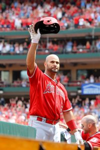 Albert Pujols #5 of the Los Angeles Angels of Anaheim gives fans a curtain call after hitting a solo home run during the seventh inning against the St. Louis Cardinals at Busch Stadium on June 22, 2019 in St. Louis, Missouri. (Credit: Scott Kane/Getty Images)