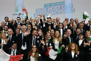 Members of the delegation of Milan/Cortina d'Ampezzo 2026 Winter Olympics candidate city react after the city was elected to host the 2026 Olympic Winter Games during the 134th session of the International Olympic Committee (IOC), in Lausanne on June 24, 2019. (Credit: PHILIPPE LOPEZ/AFP/Getty Images)