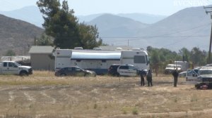 Detectives investigate the scene of a fatal deputy involved shooting at Menifee Road and Garland Lane in Menifee on June 9, 2019. (Credit: RVCNEWS)