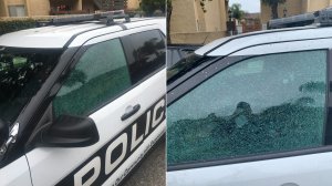 An Oxnard police vehicle is seen after one of its windows was shot out by a gunman on June 20, 2019, in photos released by the department.