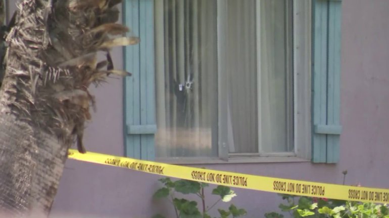 A woman was shot by burglars after a man tried to scare them off, police say. (Credit: KTLA)