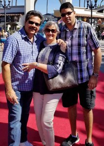 Shooting victim Kenneth French (right) and his parents, Russell and Paola French. (Credit: Courtesy Rick Shureih via CNN Wire)