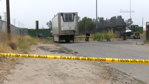 Officials investigate the scene in Colton where a woman’s body was dumped after she was shot dead in Fontana on June 25, 2019. (Credit: Inland News)