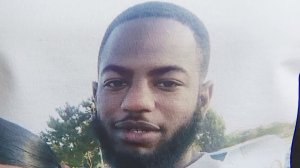 Ryan Twyman, 24, is seen in a photo shown on a T-shirt worn by a person attending a fundraiser for his family in Willowbrook on June 14, 2019. He was fatally shot by sheriff's deputies in the same neighborhood on June 6, 2019. (Credit: KTLA)