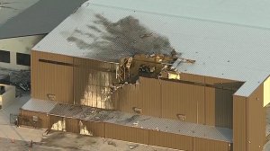 10 people died after an airplane crashed into a hangar at an airport in Addison, Texas, on June 30, 2019. (Credit: CNN)