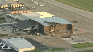 10 people died after an airplane crashed into a hangar at an airport in Addison, Texas, on June 30, 2019. (Credit: CNN)