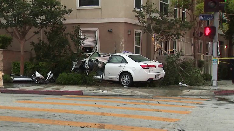 A car crashed into an apartment building in South Los Angeles on July 3, 2019. (Credit: KTLA)