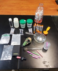 Loretto police released this photo of alleged drugs and paraphernalia seized after they served a search warrant.
