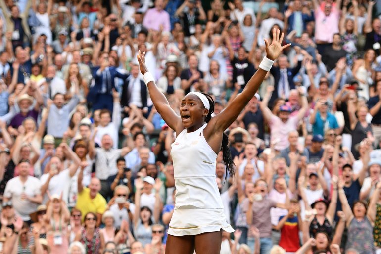 U.S. player Cori Gauff celebrates beating Slovenia's Polona Hercog during their women's singles third round match on the fifth day of the 2019 Wimbledon Championships at The All England Lawn Tennis Club in Wimbledon, southwest London, on July 5, 2019. (Credit: DANIEL LEAL-OLIVAS/AFP/Getty Images)