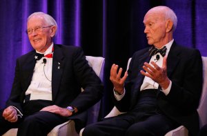 Apollo 16 astronaut Charlie Duke, left, reacts to a remark from Apollo 11 astronaut Michael Collins during the "Legends of Apollo" media event in Cocoa Beach, Florida on July 16, 2019. (Credit: Gregg Newton / AFP / Getty Images)